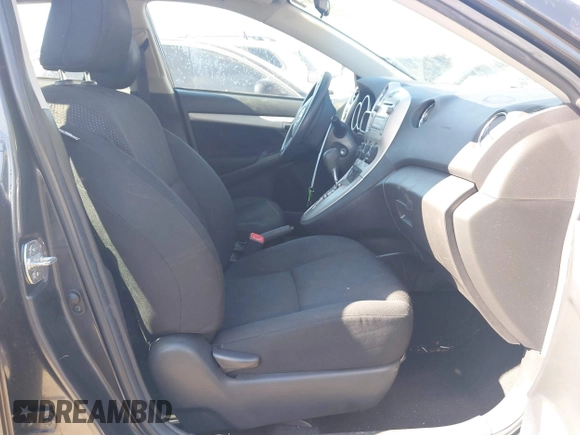 2009 Toyota Matrix with VIN 2T1KU40EX9C084721, listed as a IAAI auction lot 41748177 with 148,374 mi miles. Bid and sale history available at carsss.com. Image 5.