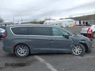 2020 Chrysler Pacifica Touring with VIN 2C4RC1FG3LR245765, listed as a IAAI auction lot 42069689 with 40,869 mi miles and . Bid and sale history available at DreamBid. Image 13.