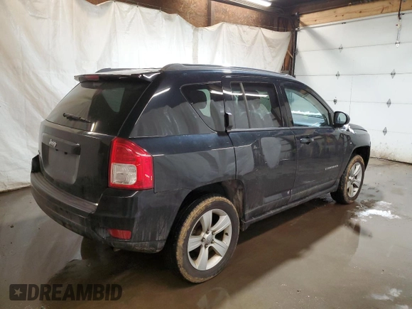 2013 Jeep Compass Sport with VIN 1C4NJDBB1DD113849, listed as a Copart auction lot 88515665 with 132,656 mi miles and Salvage Title. Bid and sale history available at carsss.com. Image 3.