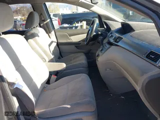 2014 Honda Odyssey LX with VIN 5FNRL5H23EB015067, listed as a IAAI auction lot 41760301 with 167,389 mi miles. Bid and sale history available at carsss.com. Image 5.