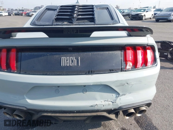 2023 Ford Mustang Mach 1 with VIN 1FA6P8R02P5502244, listed as a IAAI auction lot 41409445 with 12,573 mi miles and . Bid and sale history available at DreamBid. Image 18.