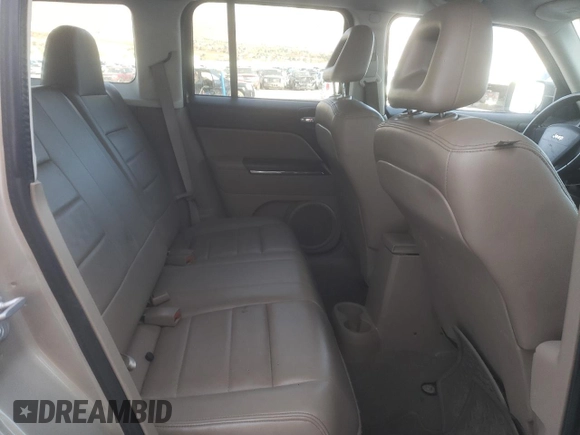 2009 Jeep Patriot z VIN 1J8FF48B39D208118, wystawiony jako Copart lot #81838154 z przebiegiem 182 457 mil mil oraz Szkoda całkowita • Salvage title. Historia ofert i sprzedaży dostępna na DreamBid. Obrazek 11.