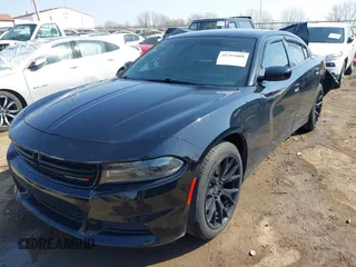 2019 Dodge Charger SXT with VIN 2C3CDXBG9KH580890, listed as a IAAI auction lot 41793008 with 52,497 mi miles. Bid and sale history available at carsss.com. Image 2.