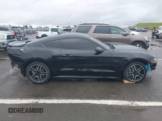 2021 Ford Mustang GT z VIN 1FA6P8CF3M5154673, wystawiony jako IAAI lot #41933201 z przebiegiem 53 757 mil mil oraz . Historia ofert i sprzedaży dostępna na DreamBid. Obrazek 14.