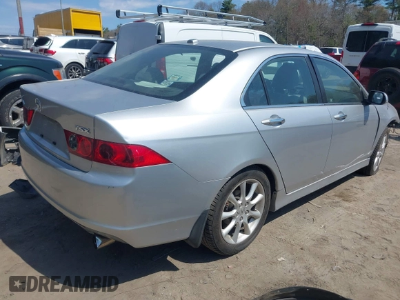 2006 Acura TSX with VIN JH4CL96826C012422, listed as a IAAI auction lot 42098806 with 186,706 mi miles and . Bid and sale history available at DreamBid. Image 4.