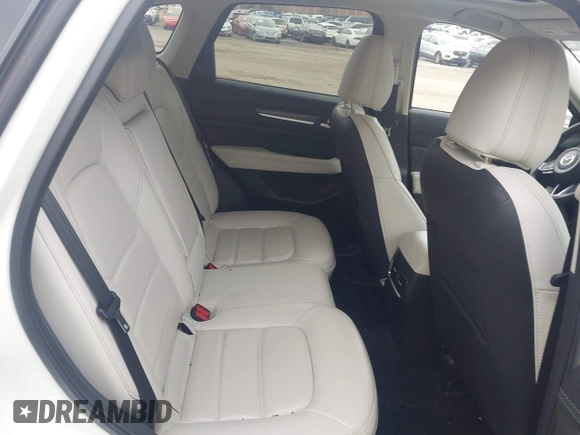 2020 Mazda CX-5 Grand Touring with VIN JM3KFBDM5L0731373, listed as a IAAI auction lot 41900567 with 31,268 mi miles and . Bid and sale history available at DreamBid. Image 8.