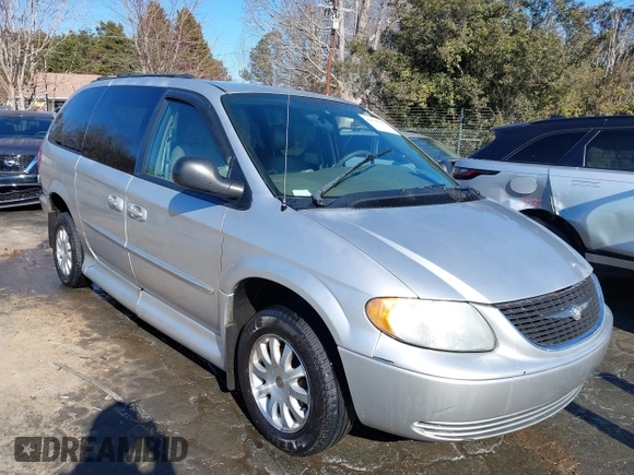 2003 Chrysler Town & Country EX with VIN 2C4GP74L83R212596, listed as a IAAI auction lot 41335410 with Not Provided miles and . Bid and sale history available at carsss.com. Image 1.