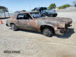 1979 Cadillac Eldorado z VIN 6L57B9E638130, wystawiony jako Copart lot #56873134 z przebiegiem Nie podano mil oraz Nie do naprawy • Non repairable. Historia ofert i sprzedaży dostępna na DreamBid. Obrazek 4.