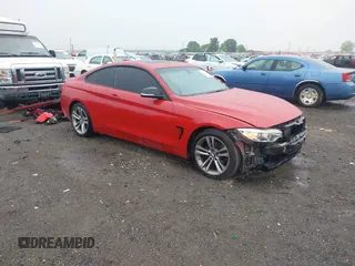 2014 BMW 4 Series 428i xDrive with VIN WBA3N9C57EK245350, listed as a IAAI auction lot 42184111 with 127,908 mi miles and . Bid and sale history available at DreamBid. Image 1.