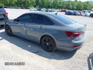2021 Volkswagen Jetta GLI S z VIN 3VW6T7BU9MM052902, wystawiony jako IAAI lot #42286711 z przebiegiem 91 519 mil mil oraz . Historia ofert i sprzedaży dostępna na DreamBid. Obrazek 3.