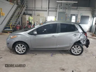 2012 Mazda 2 Touring with VIN JM1DE1LY8C0140439, listed as a IAAI auction lot 41866835 with 122,512 mi miles. Bid and sale history available at carsss.com. Image 14.