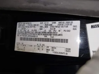 2013 Ford Econoline Cargo Van Commercial with VIN 1FTNE2EL2DDA42612, listed as a IAAI auction lot 41599646 with 207,770 mi miles. Bid and sale history available at carsss.com. Image 9.