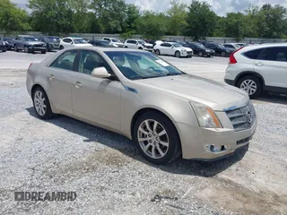 2008 Cadillac CTS AWD z VIN 1G6DP57V580109774, wystawiony jako IAAI lot #42373460 z przebiegiem 142 520 mil mil oraz . Historia ofert i sprzedaży dostępna na DreamBid. Obrazek 1.