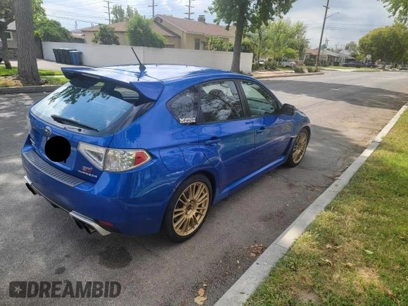 2010 Subaru WRX WRX STI with VIN JF1GR8H69AL808252, listed as a Copart auction lot 65820635 with 130,875 mi miles and Clean title. Bid and sale history available at DreamBid. Image 4.