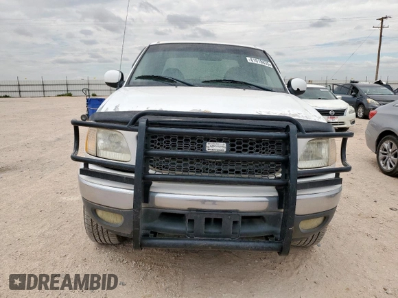 2001 Ford F-150 XLT z VIN 1FTRW08L31KF27329, wystawiony jako Copart lot #61018835 z przebiegiem Nie podano mil oraz Czysty tytuł • Clean title. Historia ofert i sprzedaży dostępna na DreamBid. Obrazek 5.