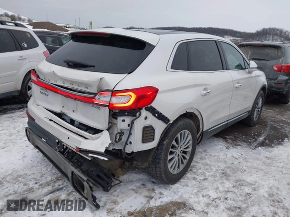 2016 Lincoln MKX Select with VIN 2LMTJ8KR3GBL31765, listed as a IAAI auction lot 41352530 with 155,376 mi miles. Bid and sale history available at carsss.com. Image 4.