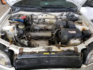 2000 Toyota RAV4 z VIN JT3GP10V5Y0049271, wystawiony jako Copart lot #56158045 z przebiegiem 188 900 mil mil oraz Czysty tytuł • Clean title. Historia ofert i sprzedaży dostępna na DreamBid. Obrazek 12.