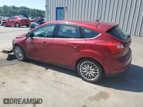 2014 Ford Focus Titanium z VIN 1FADP3N29EL409568, wystawiony jako Copart lot #62295345 z przebiegiem 53 401 mil mil oraz Szkoda całkowita • Salvage title. Historia ofert i sprzedaży dostępna na DreamBid. Obrazek 2.