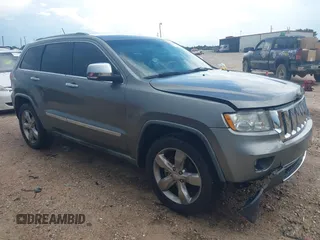 2011 Jeep Grand Cherokee Overland with VIN 1J4RS6GG0BC739582, listed as a IAAI auction lot 42537983 with 137,372 mi miles and . Bid and sale history available at DreamBid. Image 1.
