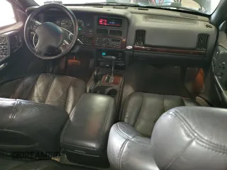 1998 Jeep Grand Cherokee Limited z VIN 1J4GZ88Z0WC276394, wystawiony jako Copart lot #46702355 z przebiegiem 144 232 mil mil oraz Szkoda całkowita • Salvage title. Historia ofert i sprzedaży dostępna na DreamBid. Obrazek 8.