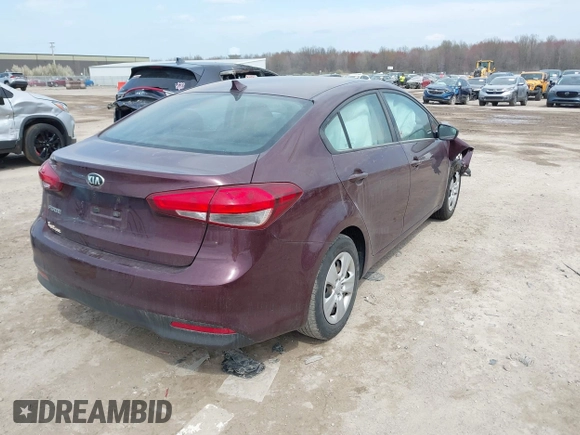 2017 Kia Forte LX with VIN 3KPFK4A76HE044840, listed as a IAAI auction lot 42057976 with 64,191 mi miles. Bid and sale history available at carsss.com. Image 4.