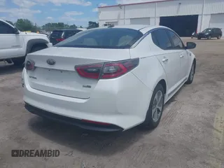 2014 Kia Optima Hybrid LX with VIN KNAGM4AD7E5075376, listed as a IAAI auction lot 42179468 with 131,920 mi miles. Bid and sale history available at carsss.com. Image 4.