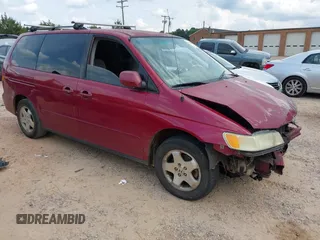 2002 Honda Odyssey EX with VIN 5FNRL18612B028570, listed as a IAAI auction lot 42491201 with 203,401 mi miles and . Bid and sale history available at DreamBid. Image 1.