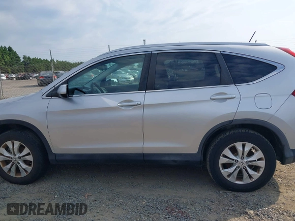 2013 Honda CR-V EX-L with VIN 2HKRM4H74DH628155, listed as a IAAI auction lot 42881796 with 208,334 mi miles and . Bid and sale history available at DreamBid. Image 14.