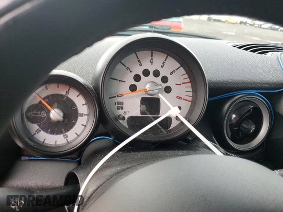 2013 MINI Convertible S with VIN WMWZP3C55DT297215, listed as a Copart auction lot 87995095 with Not provided miles and Salvage title. Bid and sale history available at DreamBid. Image 9.
