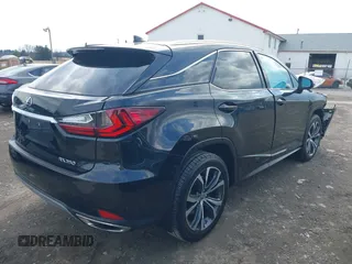 2022 Lexus RX with VIN 2T2HZMDA8NC328150, listed as a IAAI auction lot 41686701 with 42,987 mi miles. Bid and sale history available at carsss.com. Image 4.