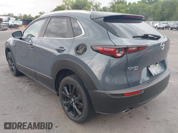 2022 Mazda CX-30 S Carbon Edition with VIN 3MVDMBCL6NM431985, listed as a IAAI auction lot 42610558 with Not provided miles and . Bid and sale history available at DreamBid. Image 3.