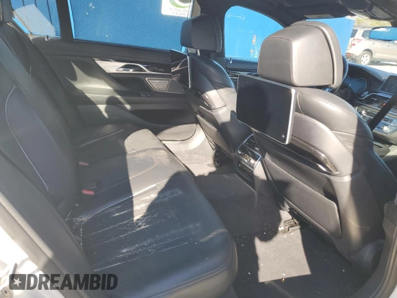 2016 BMW 7 Series 750i with VIN WBA7F0C56GGL99161, listed as a Copart auction lot 87652655 with 97,805 mi miles and Salvage Title. Bid and sale history available at carsss.com. Image 10.