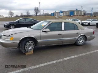 2001 Lincoln Continental with VIN 1LNHM97VX1Y627039, listed as a IAAI auction lot 41482016 with 143,317 mi miles and . Bid and sale history available at DreamBid. Image 14.
