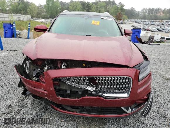 2019 Lincoln Nautilus Reserve z VIN 2LMPJ6L9XKBL57034, wystawiony jako Copart lot #51652415 z przebiegiem 51 302 mil mil oraz Szkoda całkowita • Salvage title. Historia ofert i sprzedaży dostępna na DreamBid. Obrazek 5.