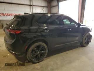 2023 Buick Envision Essence with VIN LRBFZPR46PD061496, listed as a Copart auction lot 49691695 with 71,751 mi miles and Salvage Title. Bid and sale history available at carsss.com. Image 3.