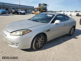 2008 Hyundai Tiburon GS with VIN KMHHM66D38U286530, listed as a Copart auction lot 80779474 with 258,212 mi miles and Salvage Title. Bid and sale history available at carsss.com. Image 1.