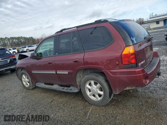 2003 GMC Envoy SLT with VIN 1GKDT13S032245485, listed as a Copart auction lot 84385304 with 139,183 mi miles and Salvage Title. Bid and sale history available at carsss.com. Image 2.