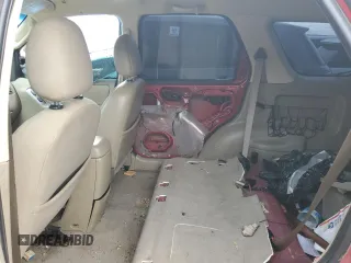 2005 Ford Escape XLT with VIN 1FMYU03175KA63888, listed as a Copart auction lot 71617174 with 145,107 mi miles and Salvage Title. Bid and sale history available at carsss.com. Image 12.