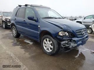 2000 Mercedes-Benz M-Class with VIN 4JGAB72E1YA198542, listed as a IAAI auction lot 41591206 with 159,300 mi miles. Bid and sale history available at carsss.com. Image 1.