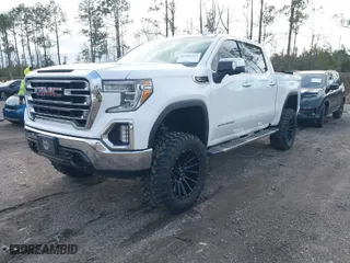 2019 GMC Sierra 1500 SLT with VIN 1GTU9DEDXKZ142784, listed as a IAAI auction lot 41405713 with 85,414 mi miles. Bid and sale history available at carsss.com. Image 2.