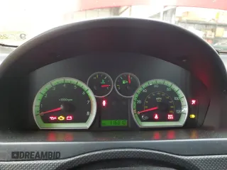 2007 Chevrolet Aveo LS z VIN KL1TD566X7B168714, wystawiony jako Copart lot #47942785 z przebiegiem 116 010 mil mil oraz Szkody całkowita. Historia ofert i sprzedaży dostępna na DreamBid. Obrazek 9.