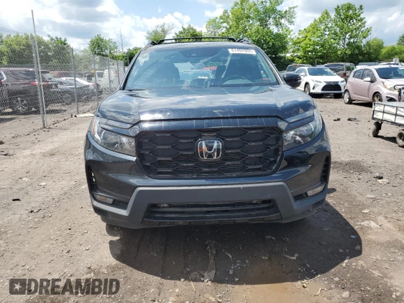 2023 Honda Passport Elite with VIN 5FNYF8H01PB030270, listed as a Copart auction lot 61402965 with 7,931 mi miles and Salvage title. Bid and sale history available at DreamBid. Image 5.