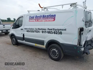 2016 Ford Transit Cargo with VIN 1FTYE1ZM6GKA95971, listed as a IAAI auction lot 42412181 with 243,171 mi miles and . Bid and sale history available at DreamBid. Image 14.