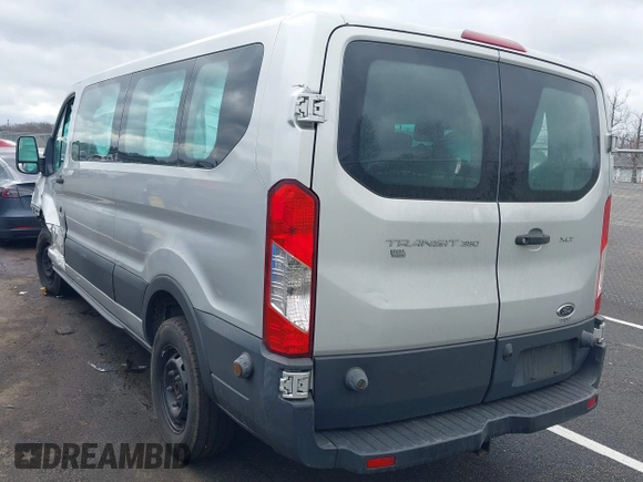 2018 Ford Transit Passenger XL z VIN 1FBZX2ZM2JKB02141, wystawiony jako IAAI lot #41914073 z przebiegiem 103 718 mil mil oraz . Historia ofert i sprzedaży dostępna na DreamBid. Obrazek 3.