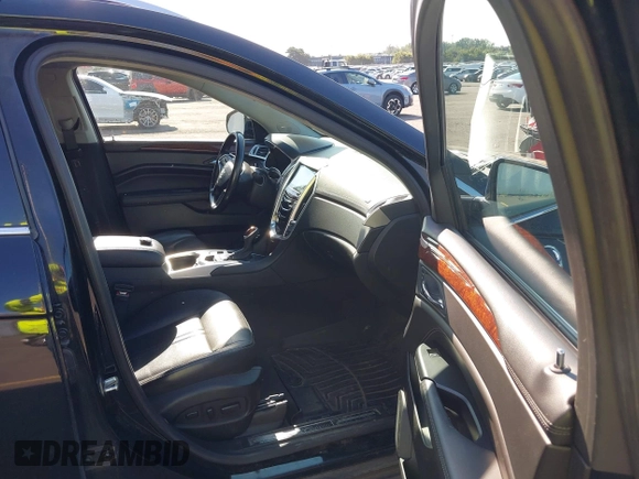 2016 Cadillac SRX Luxury Collection with VIN 3GYFNEE39GS532145, listed as a IAAI auction lot 42670496 with 193,959 mi miles and . Bid and sale history available at DreamBid. Image 5.