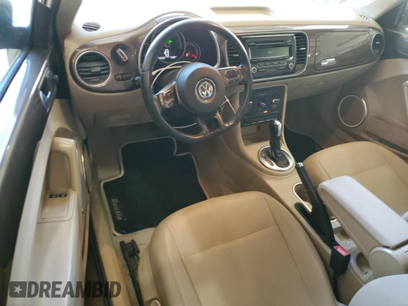 2014 Volkswagen Beetle 2.5L w/Sun with VIN 3VWJP7AT0EM632824, listed as a Copart auction lot 87279494 with Not Provided miles and Salvage Title. Bid and sale history available at DreamBid. Image 8.
