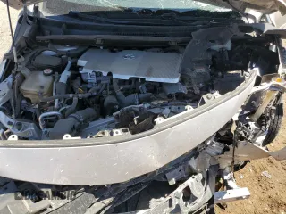 2020 Toyota Prius LE z VIN JTDKARFPXL3124035, wystawiony jako Copart lot #53996215 z przebiegiem Nie podano mil oraz Szkoda całkowita • Salvage title. Historia ofert i sprzedaży dostępna na DreamBid. Obrazek 11.