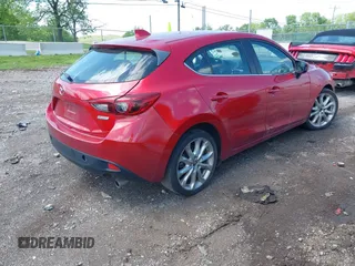 2014 Mazda 3 S Touring with VIN JM1BM1L36E1139818, listed as a IAAI auction lot 42129839 with 134,397 mi miles and . Bid and sale history available at DreamBid. Image 4.