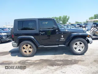 2009 Jeep Wrangler Sahara with VIN 1J4FA541X9L763737, listed as a IAAI auction lot 42721115 with 166,663 mi miles and . Bid and sale history available at DreamBid. Image 13.