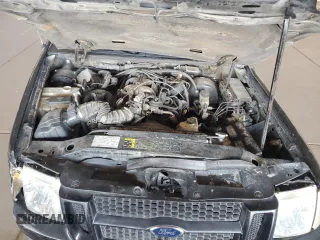 2005 Ford Explorer Sport Trac XLS с VIN 1FMZU67K15UA23188, выставлен на аукционе Copart как лот 61647445 с пробегом 212 302 миль миль и Списание • Salvage title. История ставок и продаж доступна на DreamBid. Изображение 11.